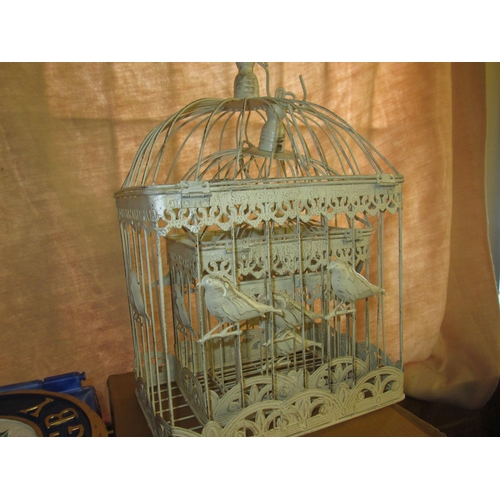 46 - Painted vintage style set of three graduated bird cages