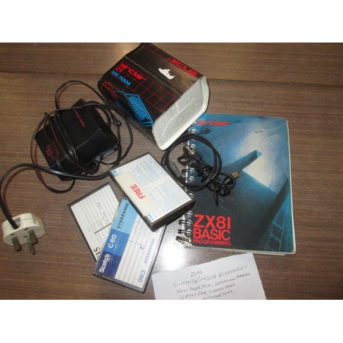 64 - Sinclair Spectrum ZX 81 accessories : mains power pack, instruction manual 16 K RAM pack 3 x games c... 