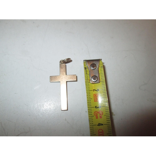 75 - Unmarked but tested 9 ct gold crucifix  1.4 g