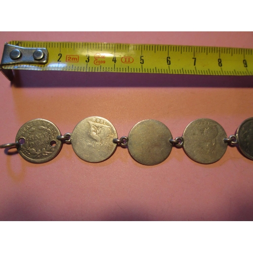 86 - Antique silver coin bracelet made up of ten silver coins all polished, US Half Dollar 1854 drilled, ... 