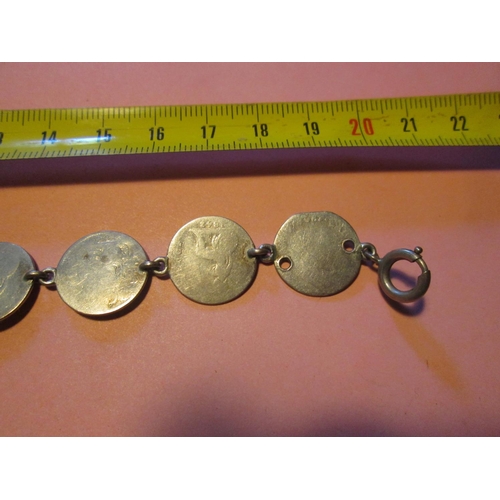 86 - Antique silver coin bracelet made up of ten silver coins all polished, US Half Dollar 1854 drilled, ... 