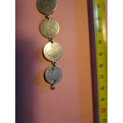 86 - Antique silver coin bracelet made up of ten silver coins all polished, US Half Dollar 1854 drilled, ... 