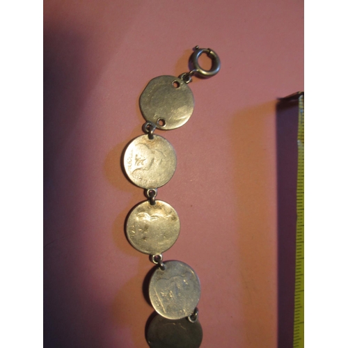 86 - Antique silver coin bracelet made up of ten silver coins all polished, US Half Dollar 1854 drilled, ... 