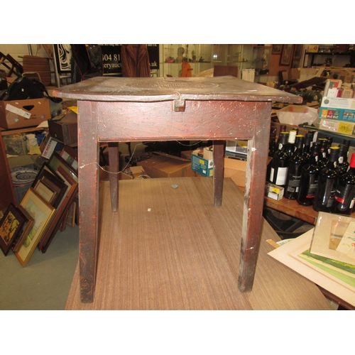 161 - 19th century elm side table with much earlier carved panel inset