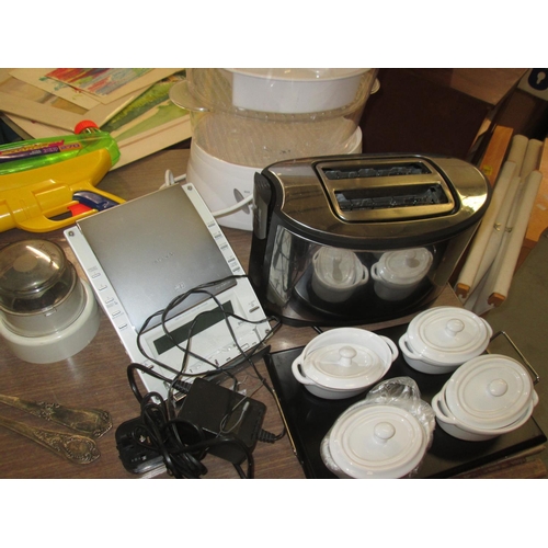 181 - Boxes of kitchenware : glassware, kitchen gadgets, toaster,  kettle, toys, cutlery, games,