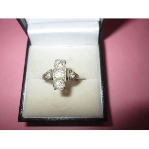 108 - Exquisite unmarked white gold art deco ring with three diamonds and further diamonds down the shank ... 