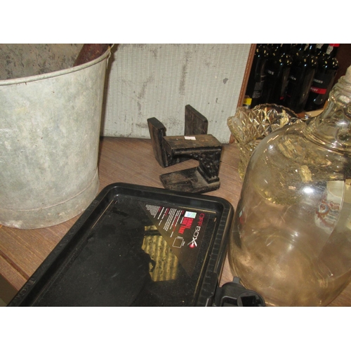 198 - Box of commemorative ware, heavy glass vase, cast iron bookends, galvanised bucket