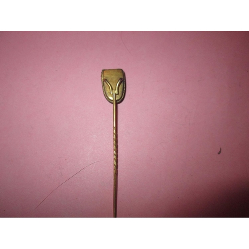 116 - Interesting tie pin in unmarked gold metal set with abstract animal face plaque