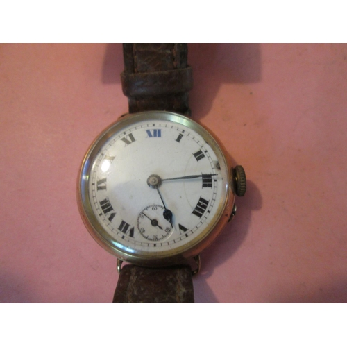 127 - Gents wristwatch from the early 1920's in 9 ct gold case with painted face and subsidiary second dia... 