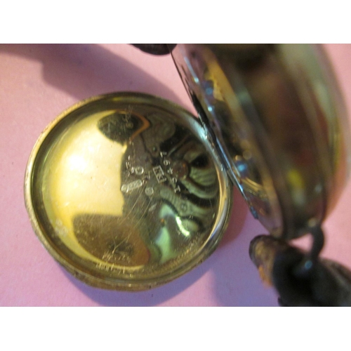 127 - Gents wristwatch from the early 1920's in 9 ct gold case with painted face and subsidiary second dia... 