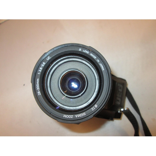 273 - Pentax P30  camera body with Sigma zoom lens 28 -200 mm