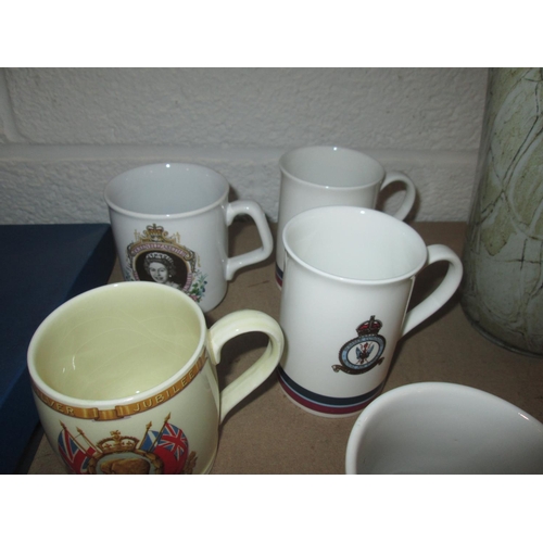 328 - Commemorative ware : Queen Elizabeth II mugs, George V silver jubilee