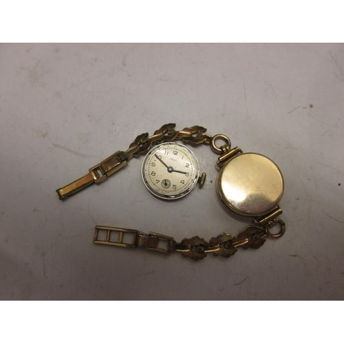 475 - Vintage ladies Isis wristwatch in 9 ct gold case with gold plated strap