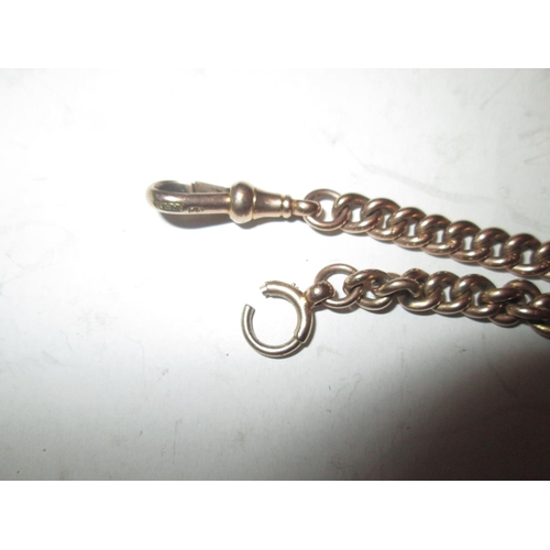 543 - 9 ct gold watch chain with spinning hardstone fob 22 g