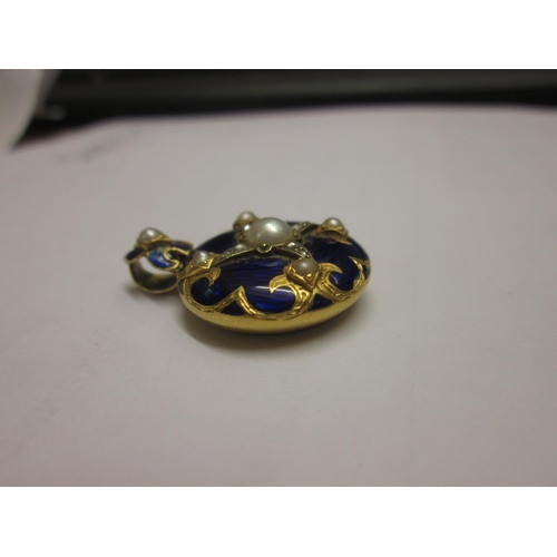 98 - Early 20th century unmarked but tested 9 ct gold and blue enamel photograph locket pendant set with ... 