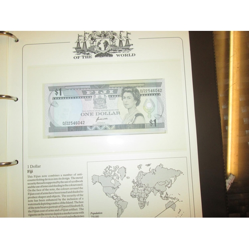 410 - Album of 11 various mixed denomination banknotes from around the world presented in a SG collectors ... 