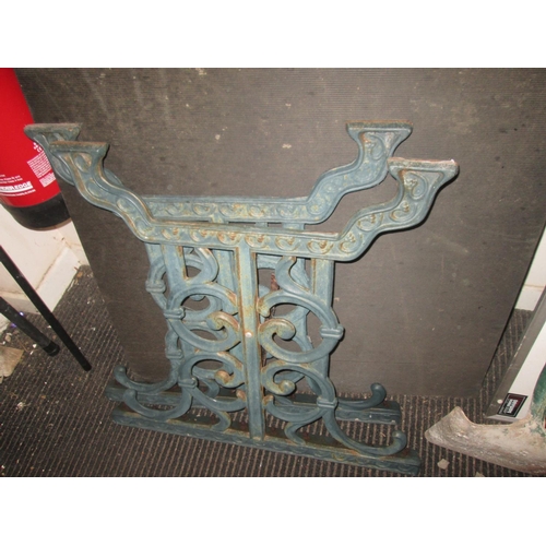 36 - Cast metal patio table ends