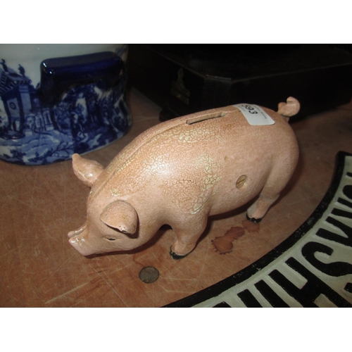 60 - Cast iron piggy bank