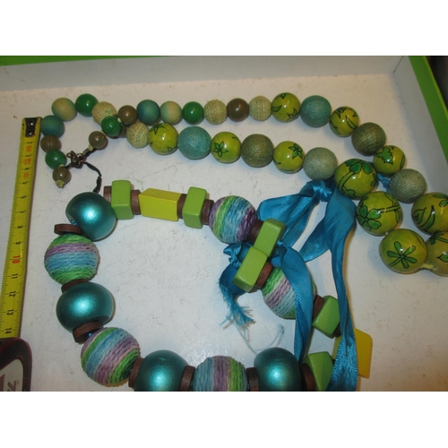 63 - 2 x wooden beaded necklaces
