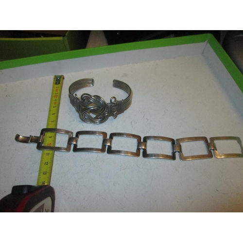 66 - Base metal wirework bangle and open link bracelet