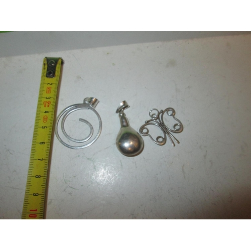 68 - 3 x silver pendants