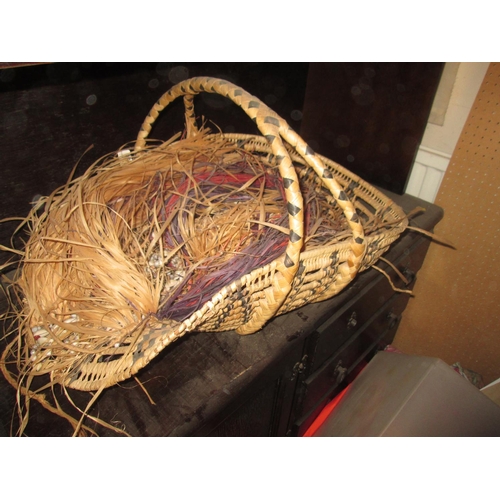 134 - Southern Hemisphere grass skirt with cowrie shell decoration and basket