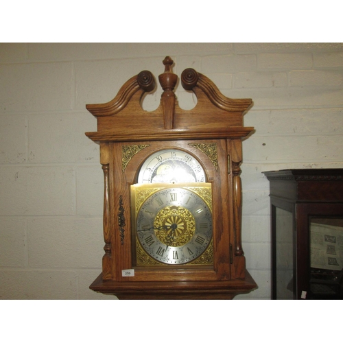 259 - 20th century longcase clock in oak case by Emperor Clock Company