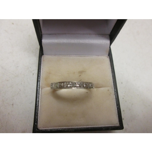 671 - 18th ct white gold semi eternity ring 3.7 g size R