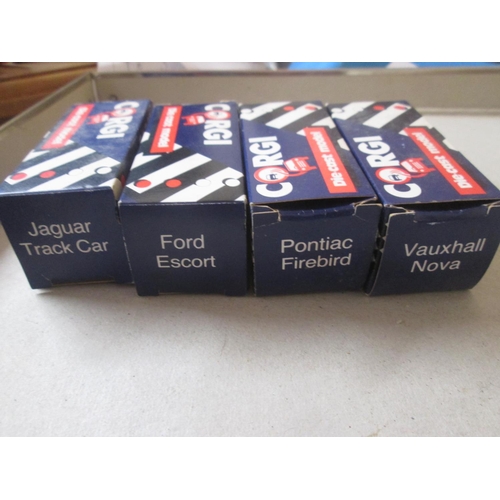 24 - 4 x Boxed die cast Corgi toy cars : Pontiac, Ford Escort, Jaguar & Vauxhall