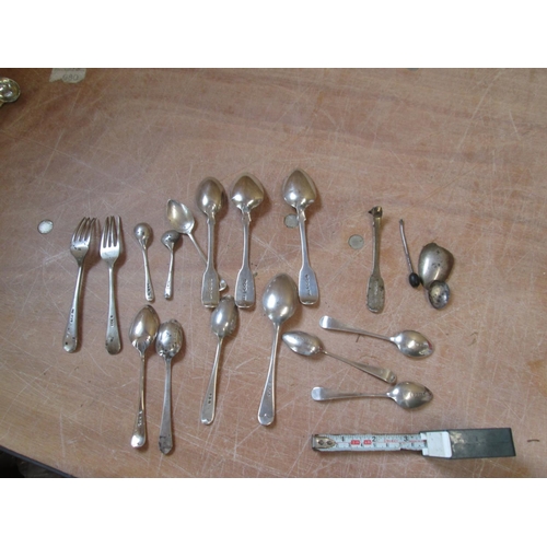 54 - A variety of silver spoons, forks some scrap included, differing dates from the late 19th - 20th cen... 