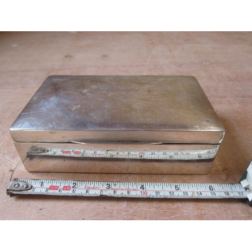 61 - Silver cigarette box, notes dings and loose hinged lid, marks rubbed, Birm.