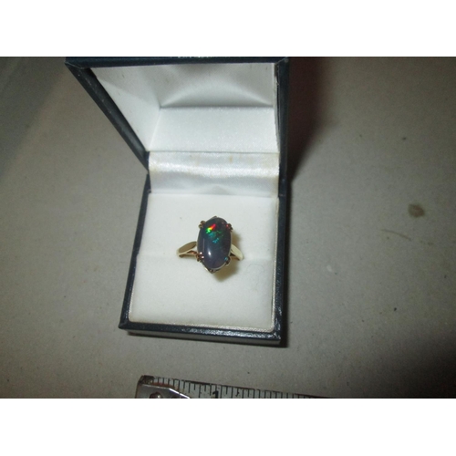 88 - Good size black opal set in 9 ct gold ring, size O , 2.6 g