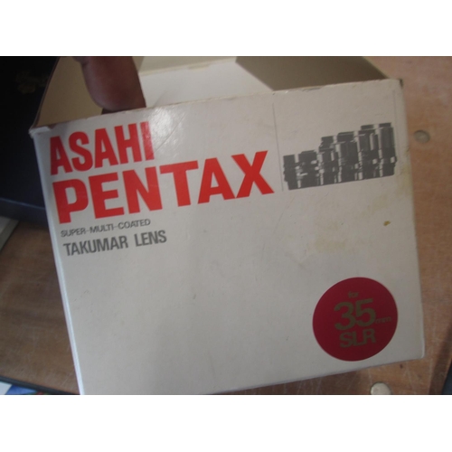 146 - Asahi Pentax lens 1: 3.5 in case and box of issue & Polaroid Model 320 Land Camera in box of issue