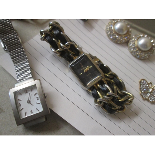 154 - Costume jewellery and wristwatches