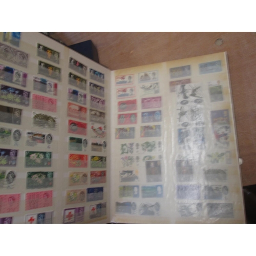 113 - Stamps : a random array of GB stamps in a SG stockbook, Commonwealth stamps, GB stamps some unmounte... 