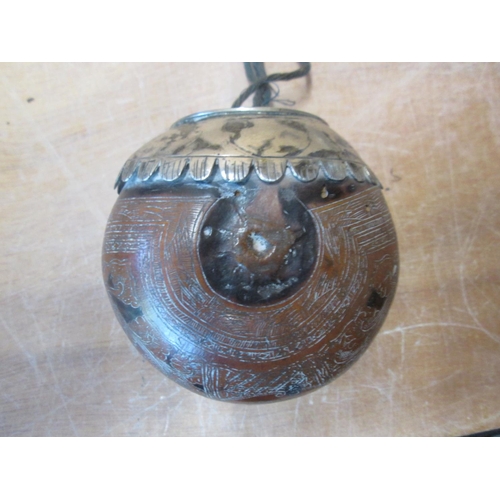 288 - Late 19th century carved Sino Tibetan seed pod flask with lower grade silver decoration 9 cms