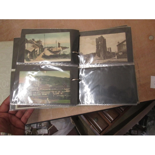 295 - Approx 156 early 20th century postcards in an album lots of South West interest