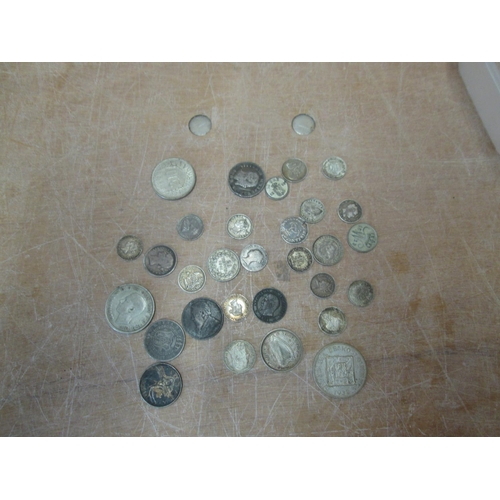 310 - Coins : Approx 29 silver coins of the world, much interest here including useful pre 1902 material f... 