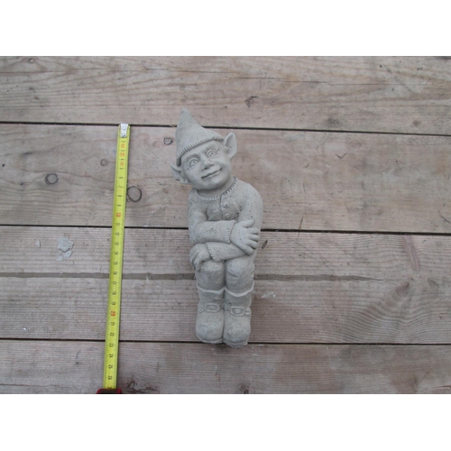 339 - Composite stone garden ornament : Seated Elf