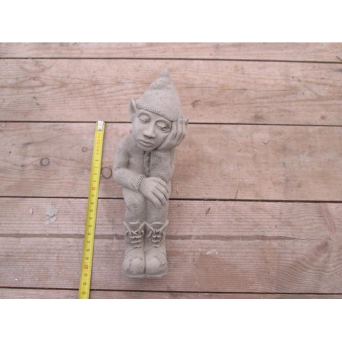 340 - Composite stone garden ornament : Seated Elf