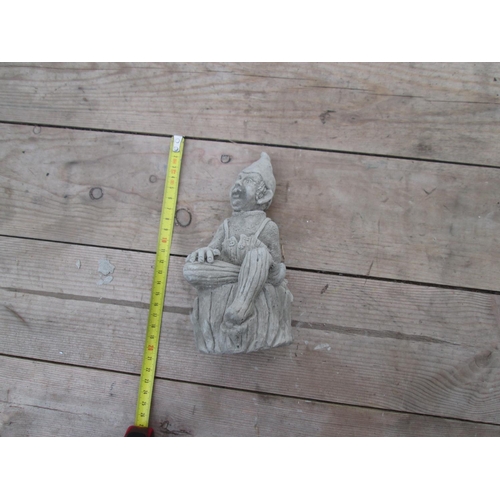 342 - Composite stone garden ornament : Seated Elf