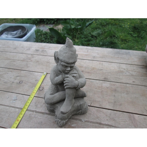 346 - Composite stone garden ornament : Seated Elf