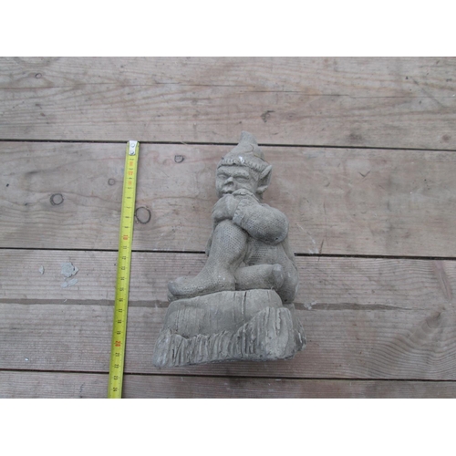 347 - Composite stone garden ornament : Seated Elf