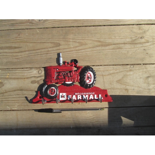 359 - Cast iron Farmall advertising key rack