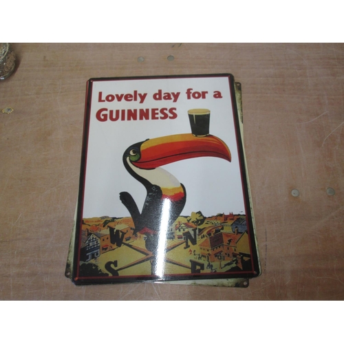 378 - Painted metal advertising sign, 20 cms x 30 cms