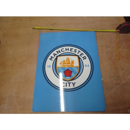 452 - Painted metal advertising sign :Manchester City F.C. (30 cms x 40 cms)