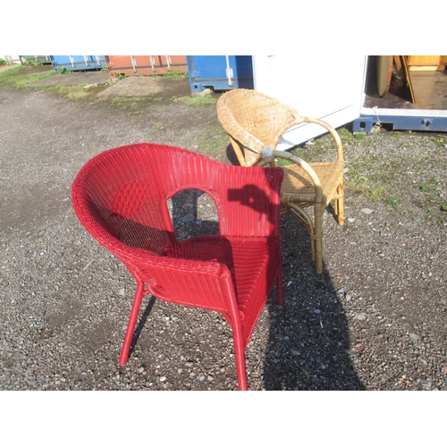 539 - Rattan and a red plastic chair