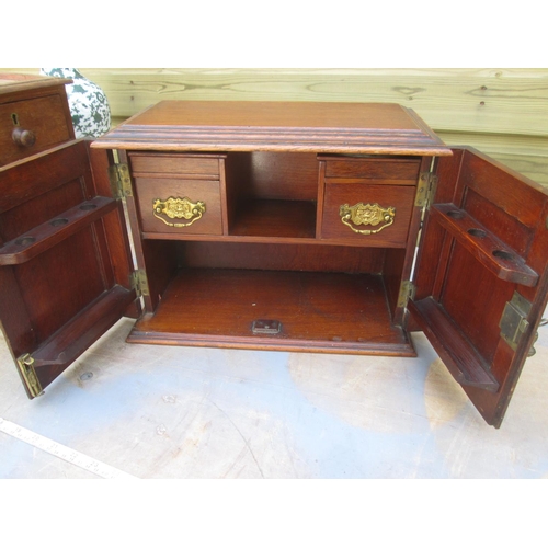 89 - Edwardian oak smokers cabinet 36 cms x 28 cms x 19 cms