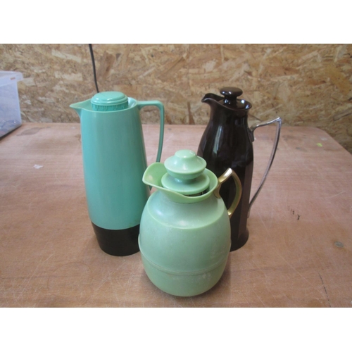 61 - Brown bakelite thermos model No 24, green bakelite thermos & one other Isovac jug