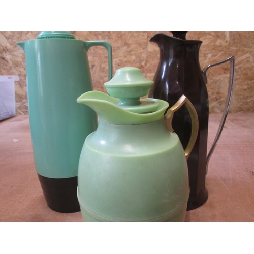 61 - Brown bakelite thermos model No 24, green bakelite thermos & one other Isovac jug